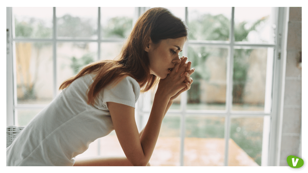 Sad Woman Thinking near Window⁠