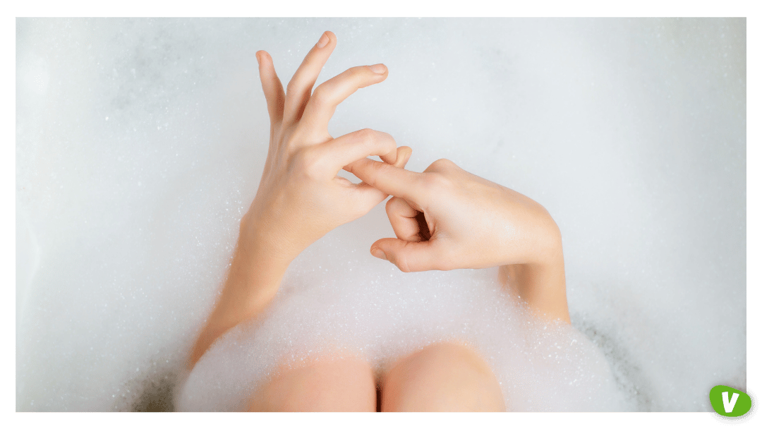 Person Gesturing Female Masturbation in Bath⁠