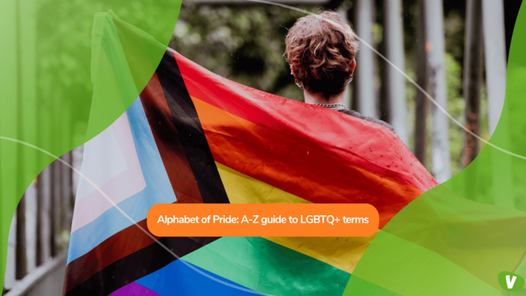 Person Holding a Progress Pride Flag Outdoors ⁠pride alphabet