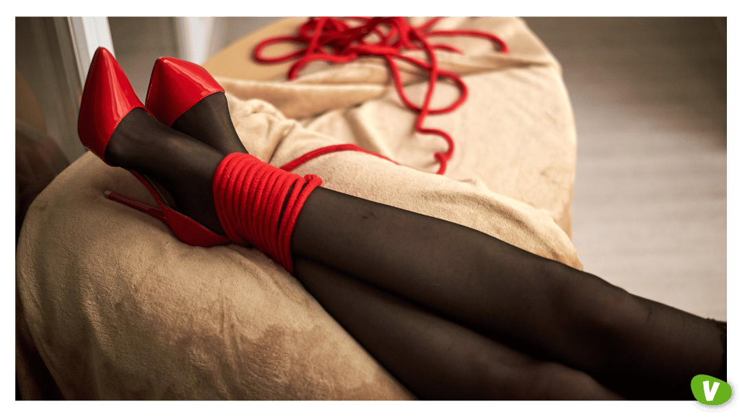 Person Wearing Red Heels and Stockings with Rope Play