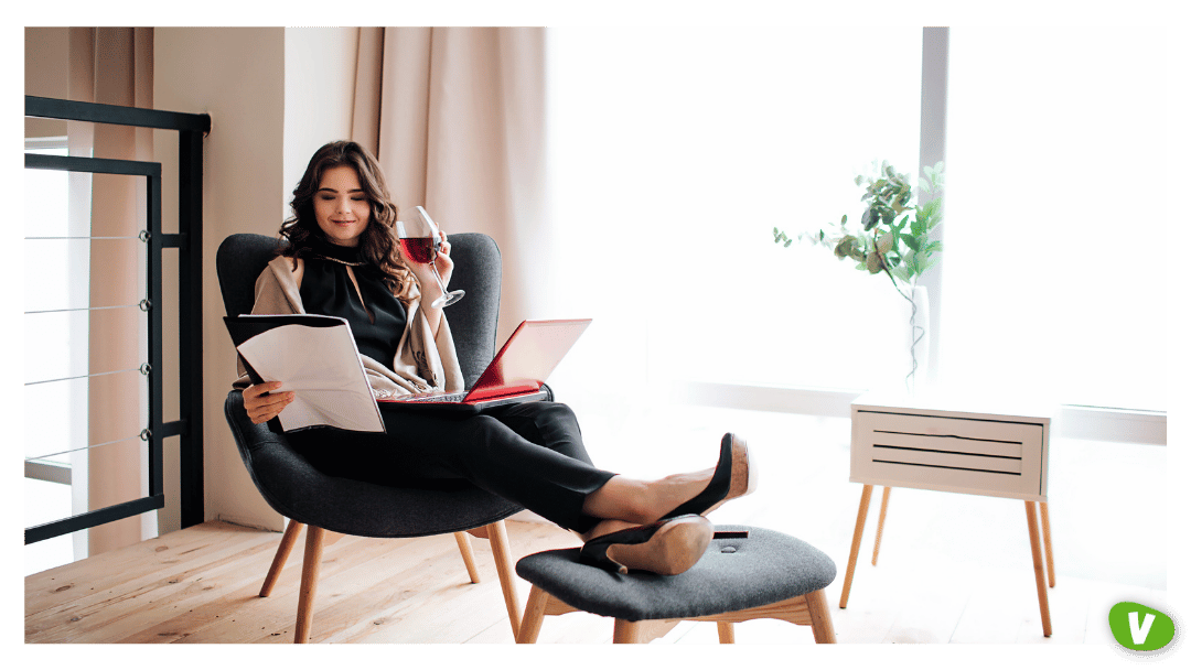 Woman Reviewing a Document Over Wine