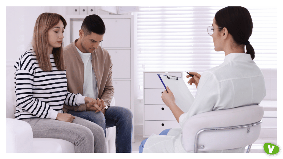 Couple Having Appointment with STD Specialist in Clinic